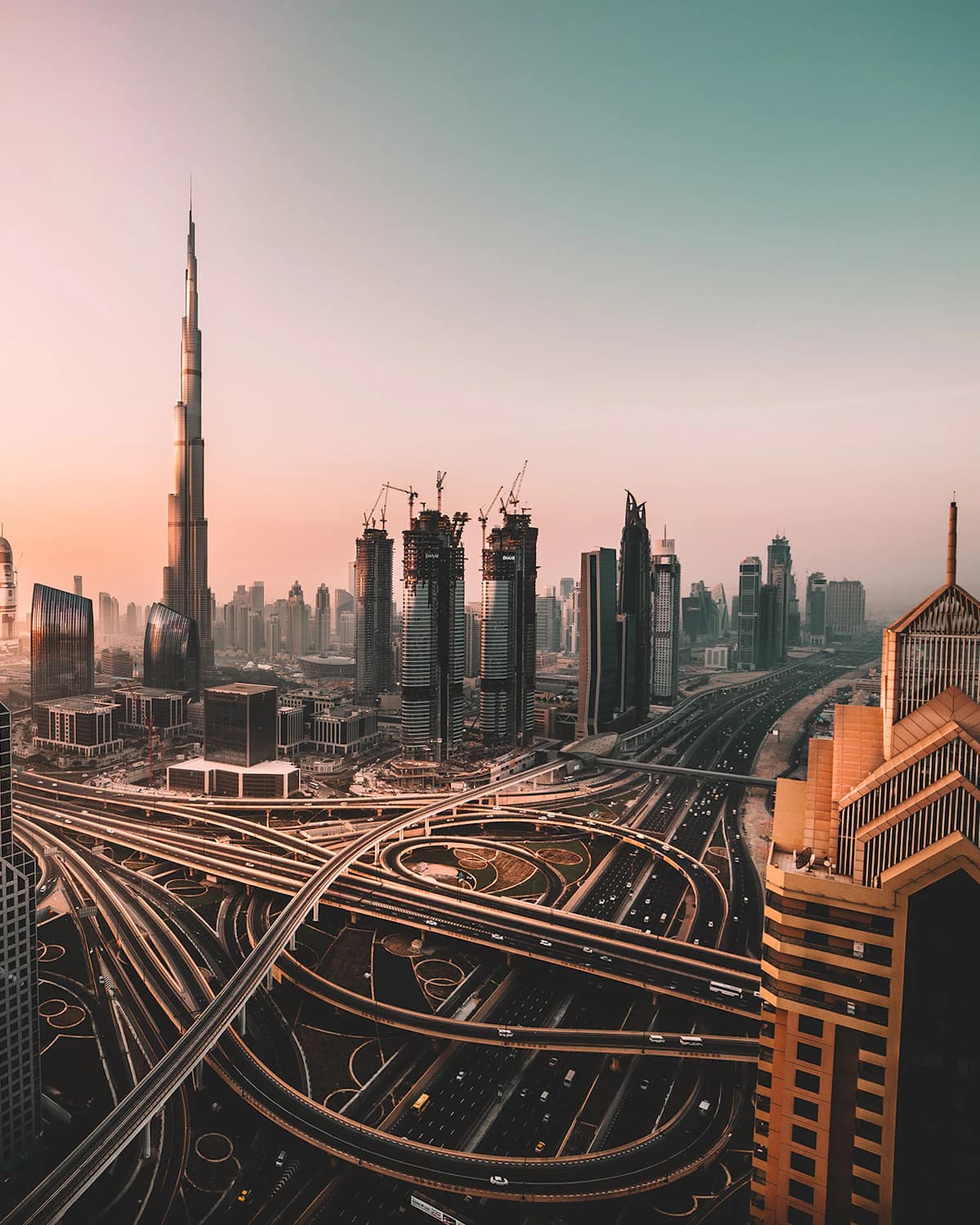 Dubai's skyline and highway interchanges at sunrise